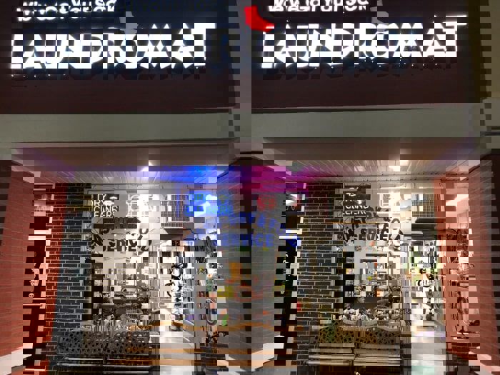 Laundromat Storefront Nighttime Min